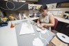 Our designer, Isabel, building a pop-up dragon